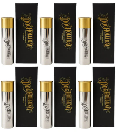 Eight Doc Holliday 10 Year Bourbon Shotgun Shell Limited Edition 100mL bottles with gold caps and silver bodies, each in a black box with ornate gold Doc Holliday branding, arranged in a grid on a white background.