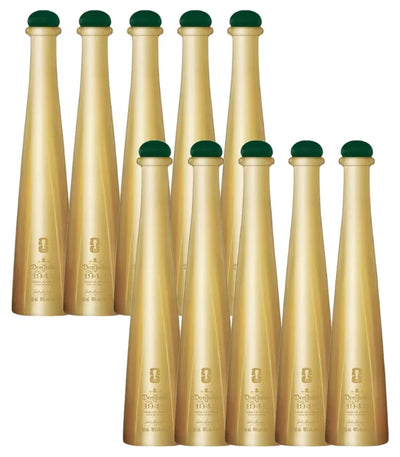 Ten sleek, gold-colored Don Julio 1942 FIFA World Cup 2026 Limited Edition 50mL bottles with green caps are arranged in two staggered rows against a white background, each featuring an embossed label.