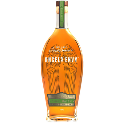 A tall, clear bottle of Angel's Envy Unique & Rare Rye Whiskey Finished In French Oak Barrels features etched angel wings, a green “Small Batch” label, brown cap with green seal, and rich amber Kentucky straight rye whiskey inside.
