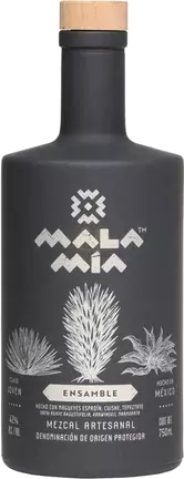 A matte black bottle of Mala Mia Ensamble Mezcal Artesanal features silver agave and geometric designs, a label with artisanal mezcal Oaxaca details in Spanish, and is finished with a wooden cap.