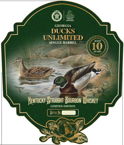 Label for World Whiskey Society Ducks Unlimited Georgia 10 Year Single Barrel Kentucky Straight Bourbon Whiskey Limited Edition, featuring two ducks by water, gold accents, and space to write the bottle number.