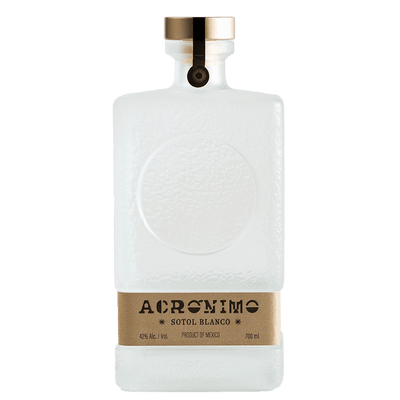 Acronimo Sotol Blanco 700ml features a rectangular, frosted glass bottle with a gold cap and base label, showcasing the artisanal elegance of this clear Mexican sotol.